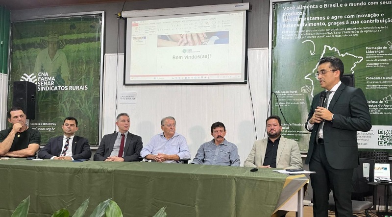 Foto horizontal de participação do TJMA de reunião de solução fundiária - mesa completa