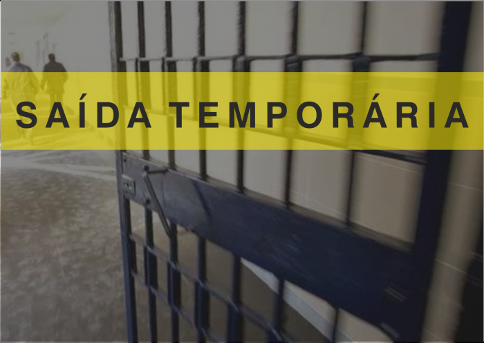 Imagem colorida. Grades de uma prisão com o texto "saída temporária".